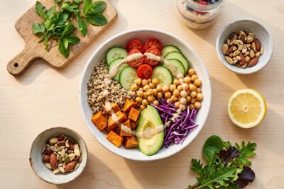 How to start a vegan diet — beginner-friendly Rainbow Buddha bowl with quinoa, chickpeas, and fresh vegetables